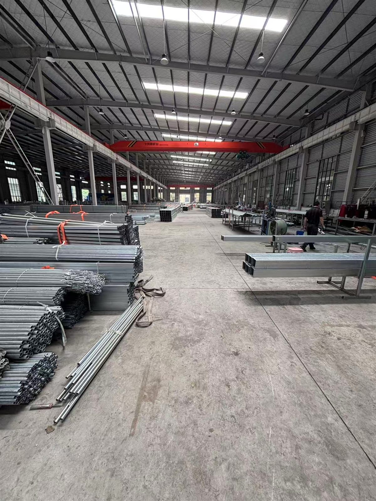 Greenhouse steel structure production hall with galvanized tube bundles