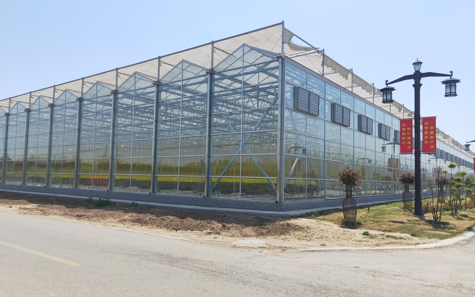 Large glass greenhouse project exterior